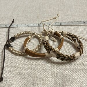 Set of 3 bracelets made of string and leather